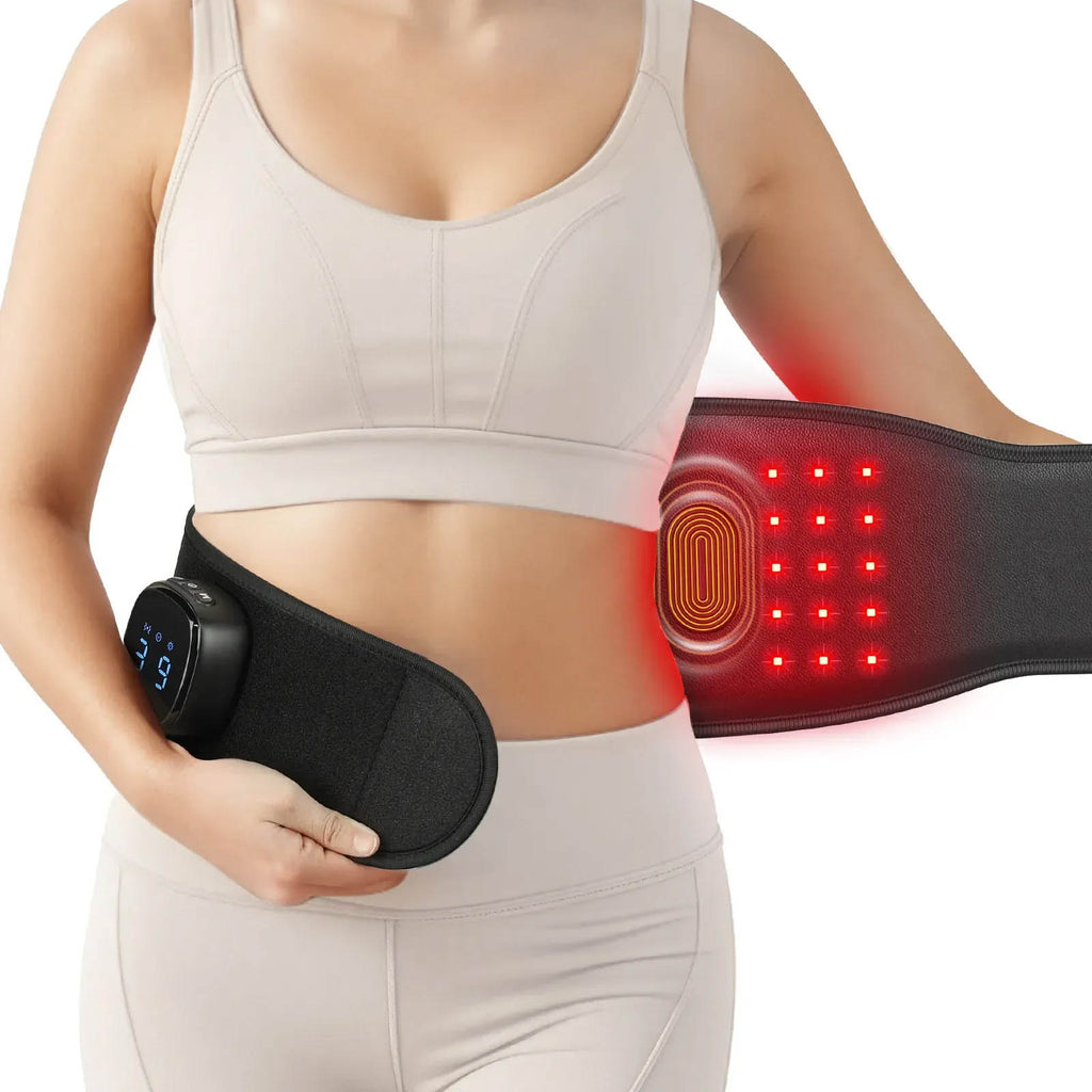 Control panel and red light LEDs of the Regain massage belt in use on the waist